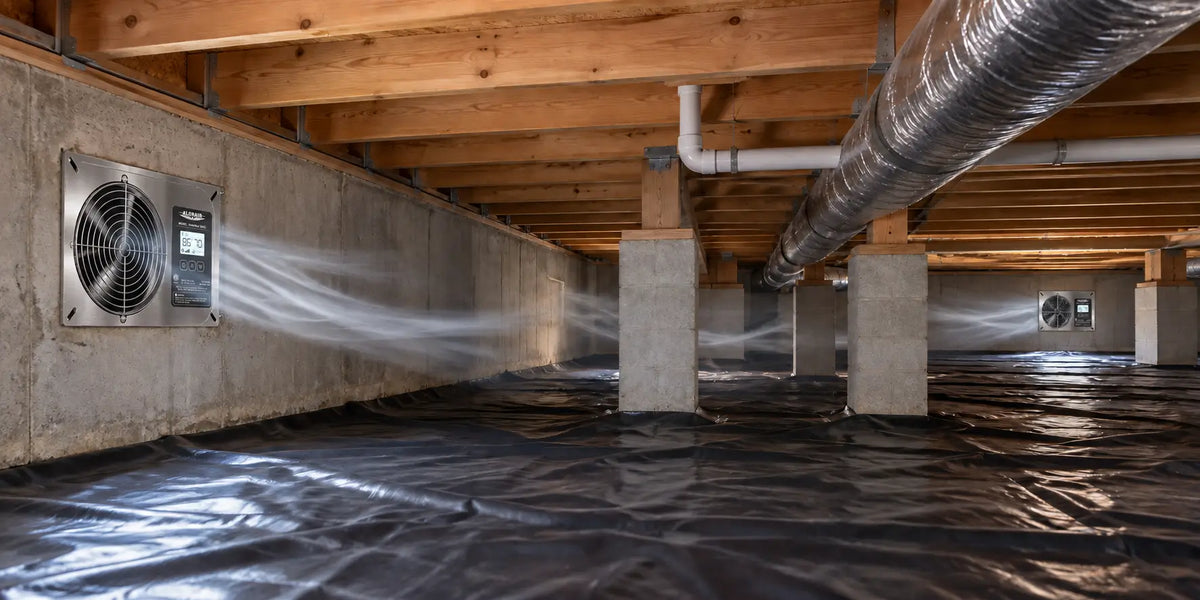 Two AlorAir VentirMax 300SD ventilation fans providing airflow across separate sections of a crawl space.